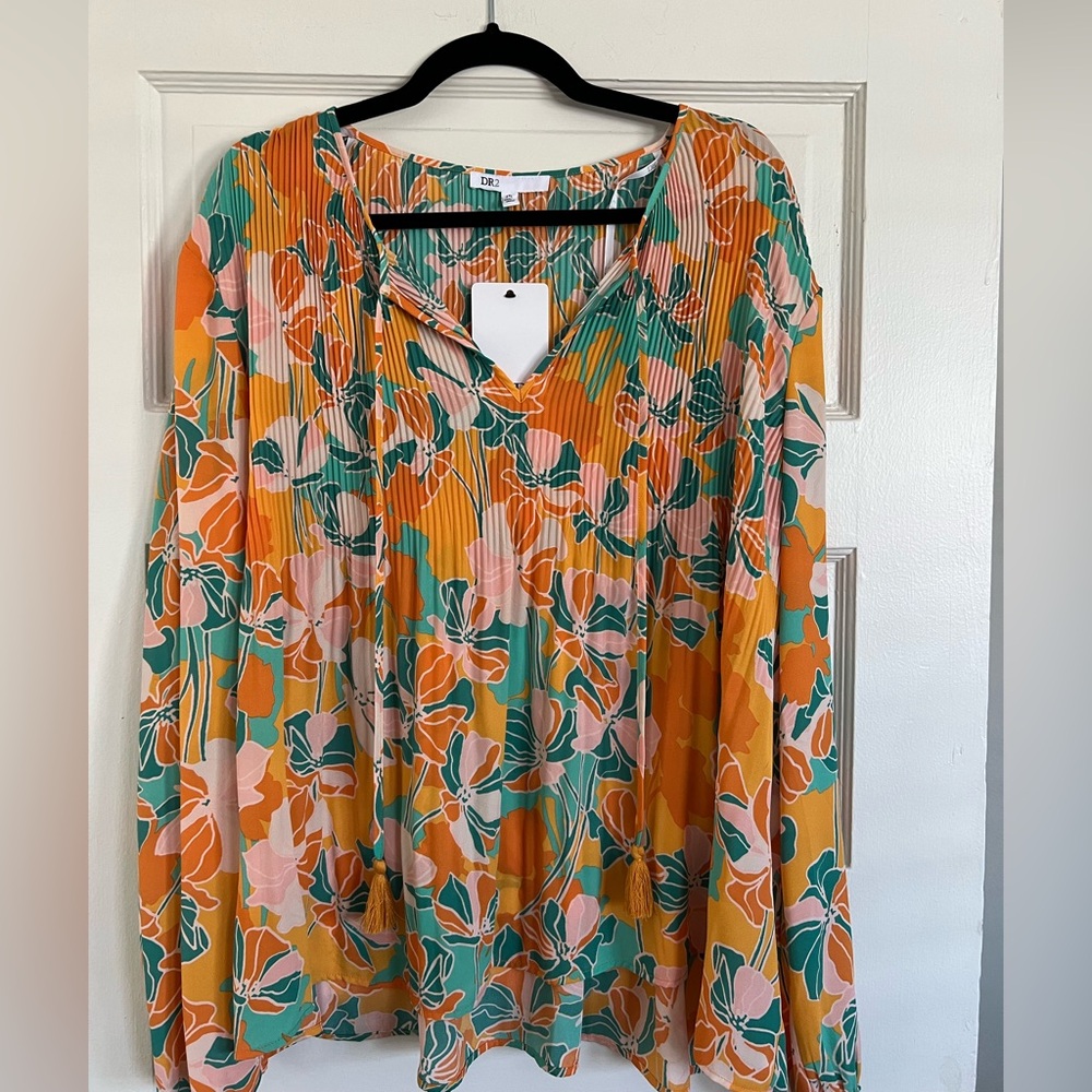 Women’s long sleeve floral blouse with tassels. Size XXL. Never worn. NWT.